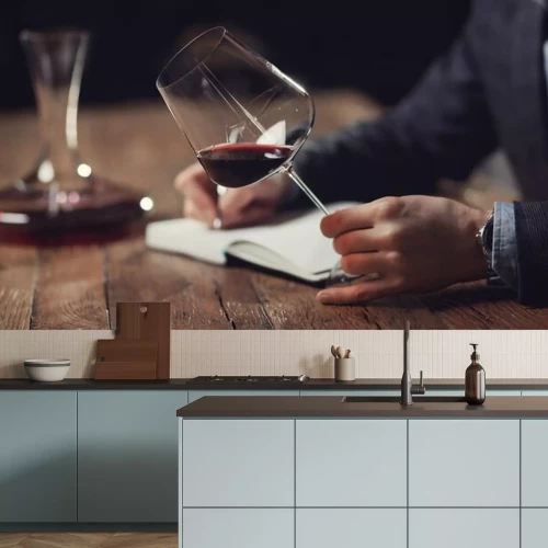 Fototapete Mann und Glas Wein