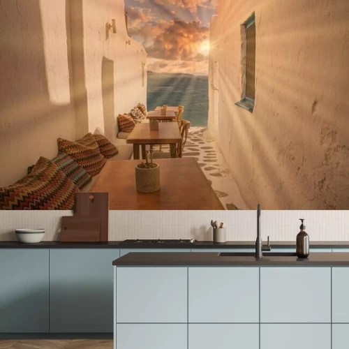 Fototapete Benches with pillows in a typical Greek bar in Mykonos town with sea view, Cyclades islands, Greece. Travel concept.