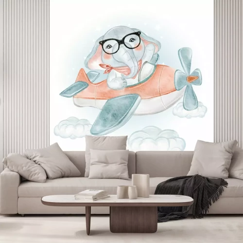 Sticker Elefant mit Brille fliegt mit einem Flugzeug