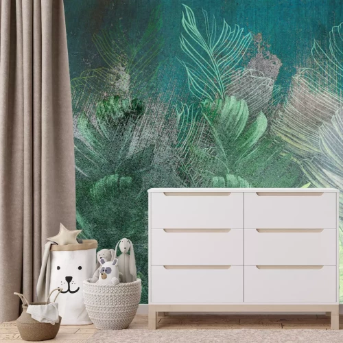 Fototapete Tropische Blätter auf einem Betonhintergrund