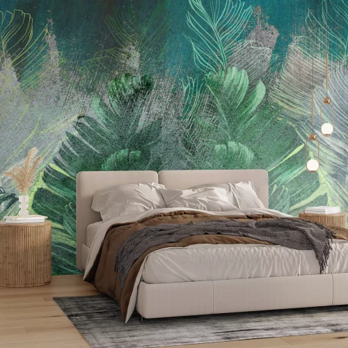 Fototapete Tropische Blätter auf einem Betonhintergrund