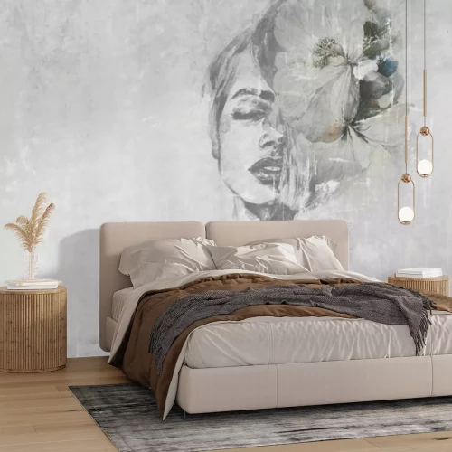 Fototapete Frauengesicht mit einer Blume auf Beton Hintergrund