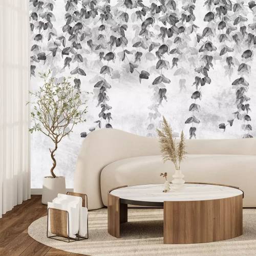 Fototapete Tropische Blätter an einer Betonwand