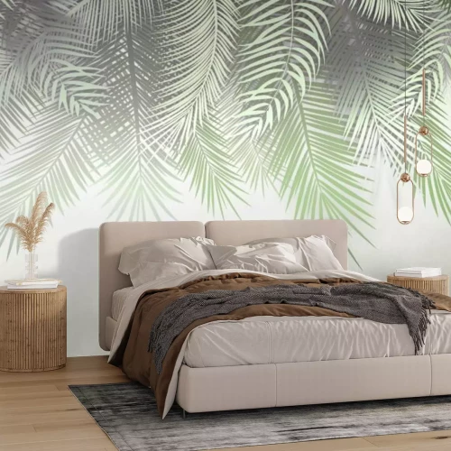 Fototapete Neblige Palmblätter an der Wand
