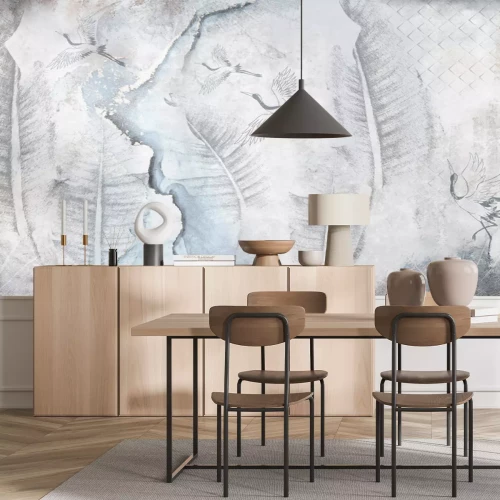 Fototapete Blätter und Kraniche auf einer Betonwand