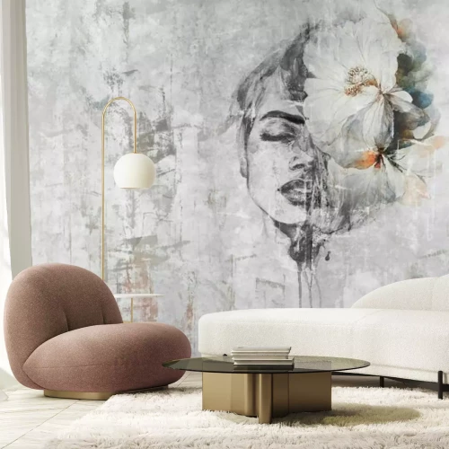 Fototapete Porträt einer Frau mit einer Blume auf Beton