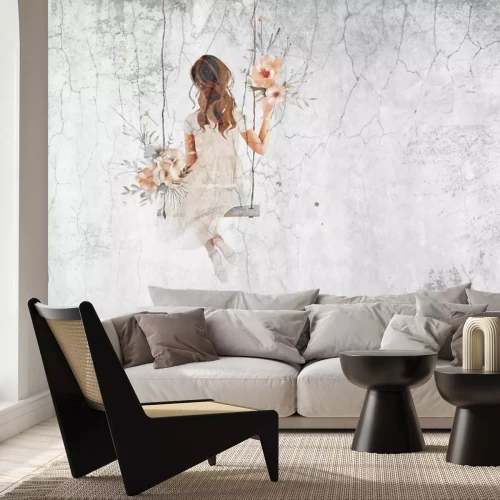 Fototapete Mädchen auf einer Schaukel mit Blumen und Betoneffekt im Hintergrund