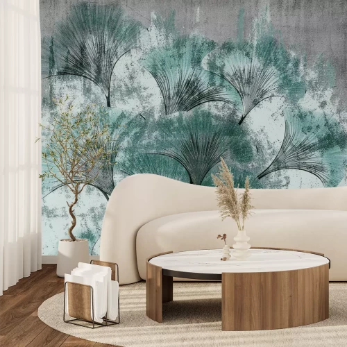 Fototapete Ginkgoblätter auf konkretem Hintergrund