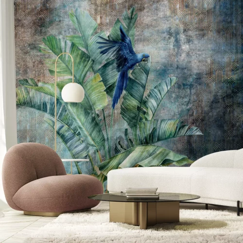 Fototapete Blauer Papagei auf Bananenblättern