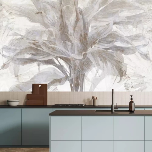 Fototapete Tropische Blätter auf hellem Betongrund