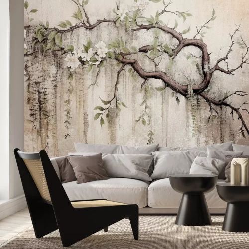 Fototapete Weiße Blumen auf einem Baum mit einer Betonstruktur im Hintergrund