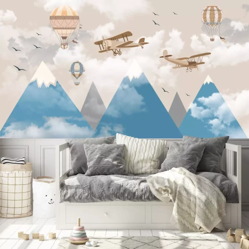 Fototapete Flugzeuge in den Wolken über einer Berglandschaft