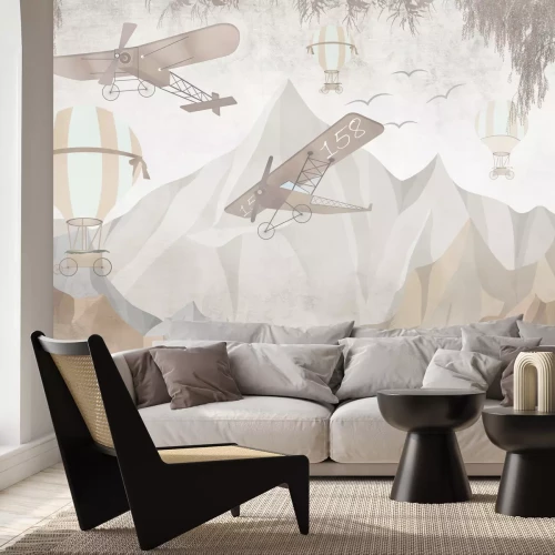 Fototapete Flugzeuge und Ballons vor einer Berglandschaft für Kinder