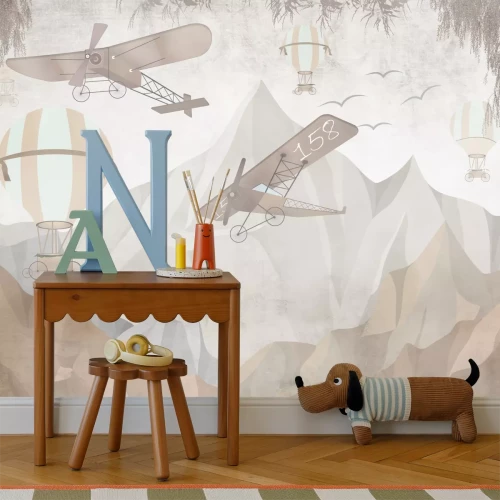 Fototapete Flugzeuge und Ballons vor einer Berglandschaft für Kinder