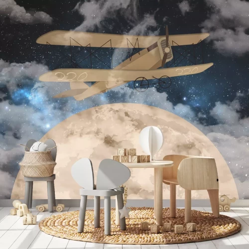 Fototapete Ein Flugzeug vor dem Himmel mit Mond und Sternen