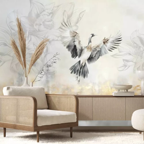 Fototapete Fliegender Vogel vor einem pflanzlichen Hintergrund