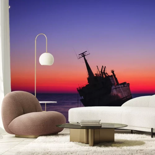 Fototapete Schiffswrack auf dem Meer bei Sonnenuntergang