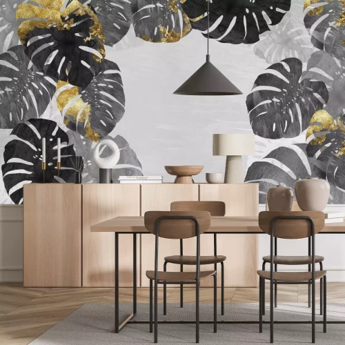 Fototapete Monstera-Blätter mit goldenen Elementen auf grauem Hintergrund