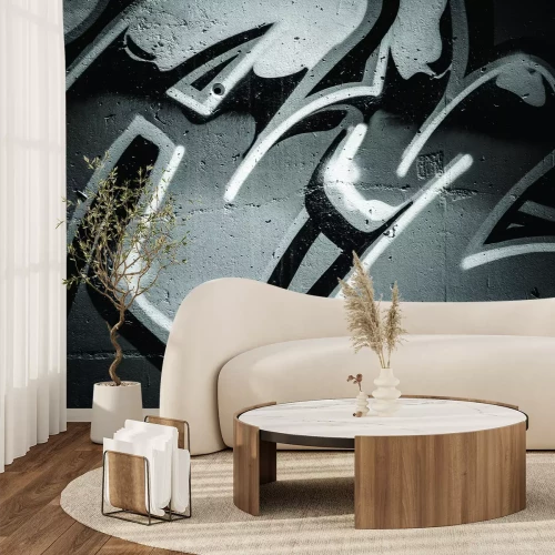 Fototapete Schwarz-weißes Graffiti an einer Betonwand