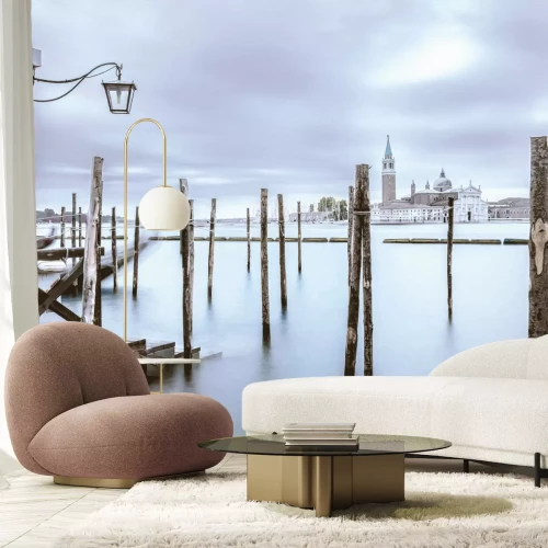 Fototapete Winterlandschaft mit einer Kirche im Hintergrund