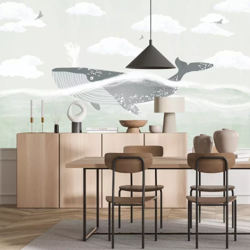 Fototapete Wal im Meer vor dem Hintergrund von Wolken und Vögeln