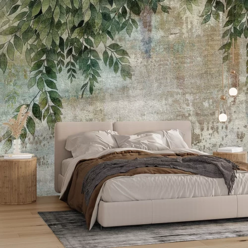 Fototapete Hängende grüne Blätter auf Beton