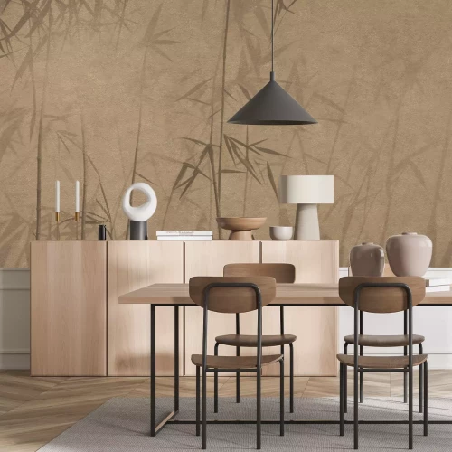 Fototapete Bambussprossen an einer braunen Wand