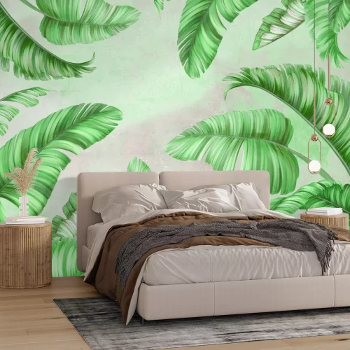 Fototapete Grüne Palmblätter auf Beton
