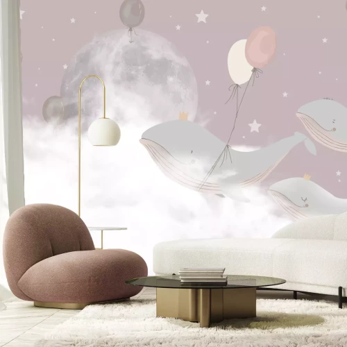 Fototapete Wale mit Luftballons vor einem rosa Himmel