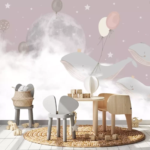 Fototapete Wale mit Luftballons vor einem rosa Himmel