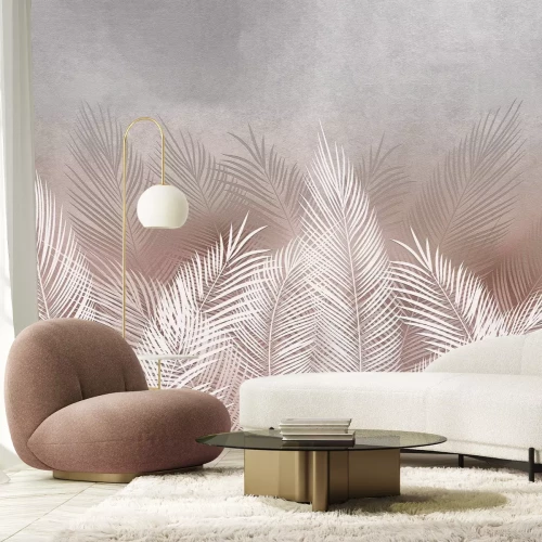 Fototapete Pflanzenmuster mit Palmenblättern in Beige- und Weißtönen auf Betonstruktur