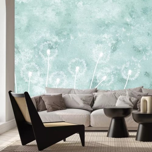 Fototapete Zarte Löwenzähne auf blauem Hintergrund