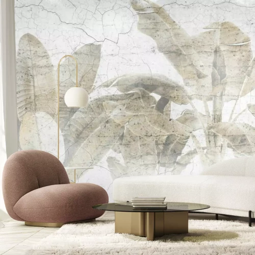 Fototapete Palmblätter an einer Betonmauer