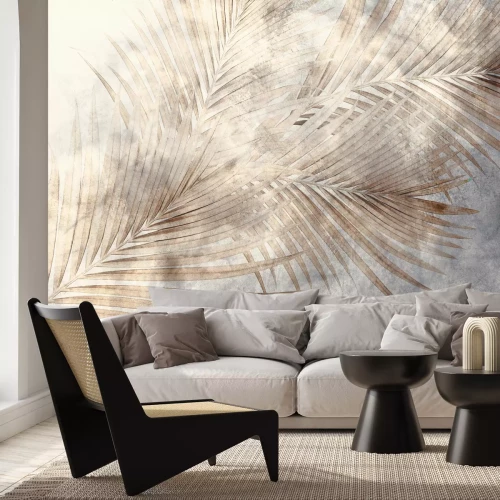 Fototapete Beige Palmblätter auf Betonhintergrund im Industriestil