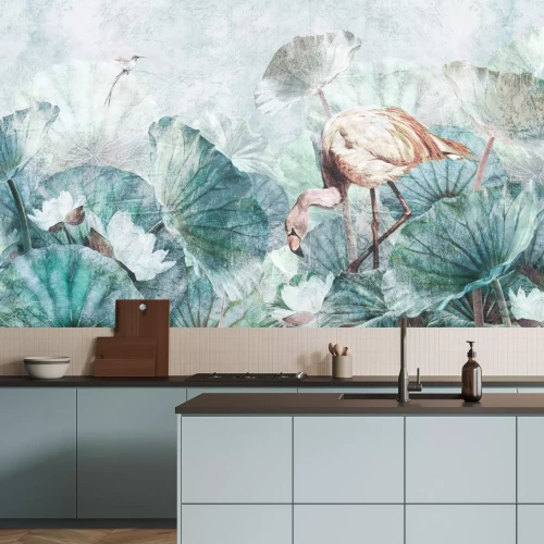 Fototapete Flamingo zwischen tropischen Blättern und Blumen