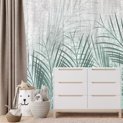 Fototapete Grüne Palmblätter auf Beton