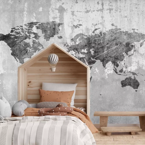 Fototapete Monochromatische Weltkarte auf Betonstruktur