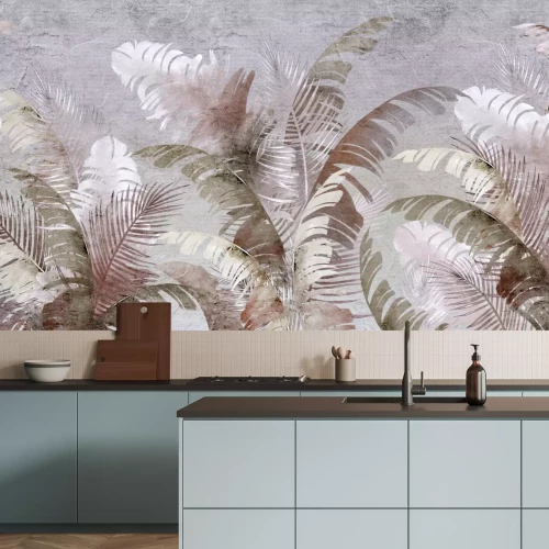 Fototapete Exotische Blätter Palme und Bananenpflanze auf strukturiertem grauem Hintergrund