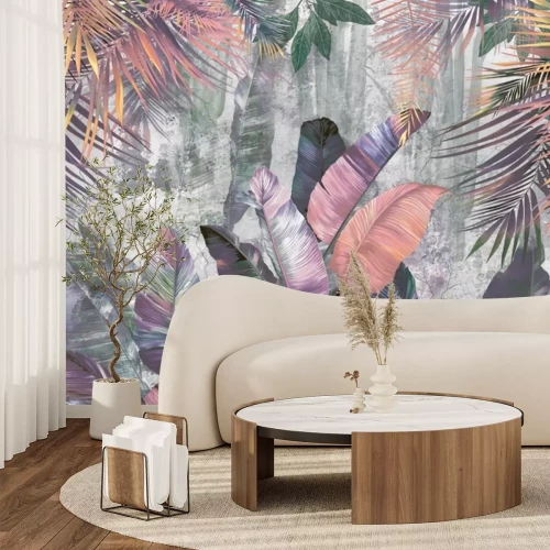 Fototapete Bunte Palm- und Bananenblätter auf Betonhintergrund