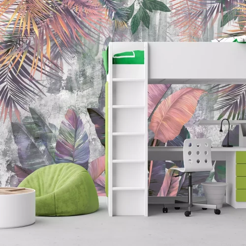 Fototapete Bunte Palm- und Bananenblätter auf Betonhintergrund