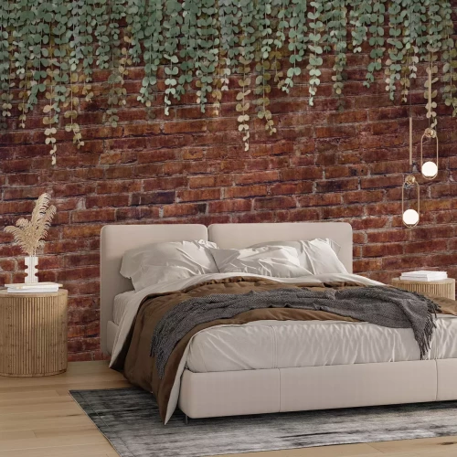 Fototapete Hängende grüne Pflanzen vor einer Ziegelmauer