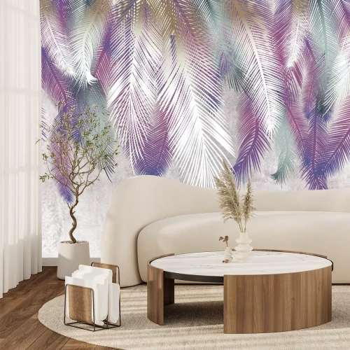 Fototapete Bunte Federn an einer Betonwand