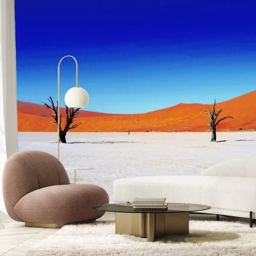 Fototapete Trockene Bäume in der Wüste mit Hügeln