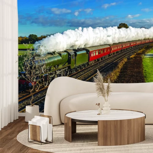 Fototapete Dampflokomotive, die durch die Felder fährt