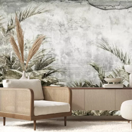 Fototapete Tropische Blätter auf Betonhintergrund