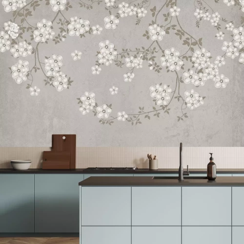 Fototapete Zweige mit weißen Blüten auf Beton