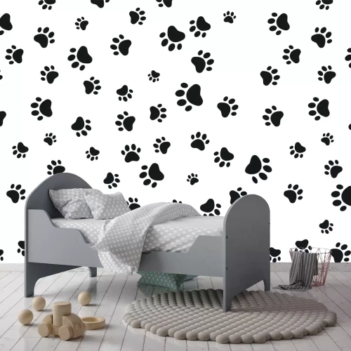 Fototapete Schwarze Hundepfoten auf weißem Hintergrund