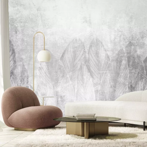 Fototapete Blätter auf grauem Beton