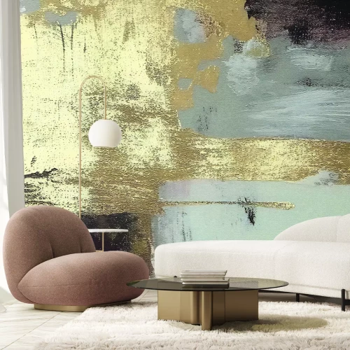 Fototapete Betonwand mit goldener Verzierung