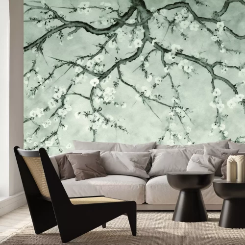 Fototapete Äste mit Kirschblüten in Grautönen